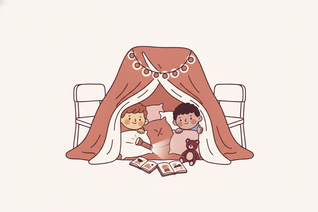 Two kids read picture books inside a blanket fort strung with lights.